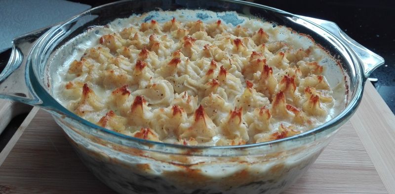 Dorsz zapiekany pod pyszną ziemniaczaną pierzynką