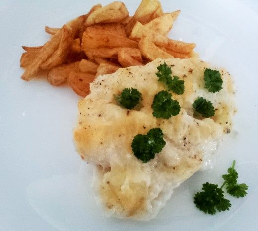 Dorsz zapiekany w sosie serowym