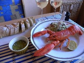 Homar z ziołowym masłem i bagietką Homar z ziołowym masłem i bagietką