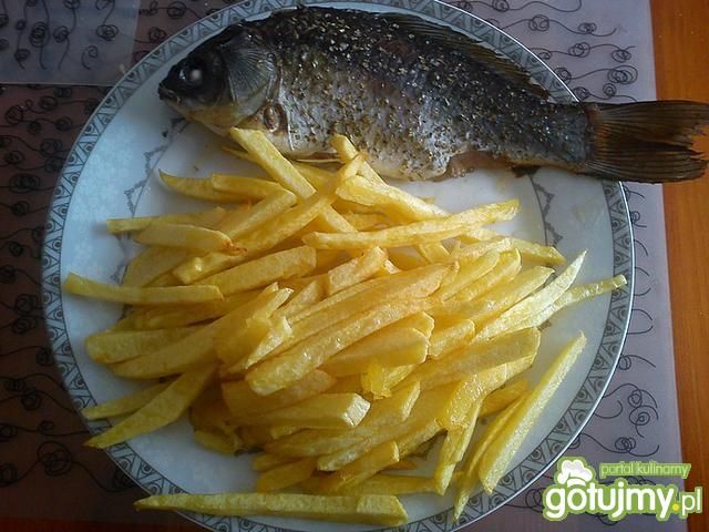 Karaś pieczony w maśle