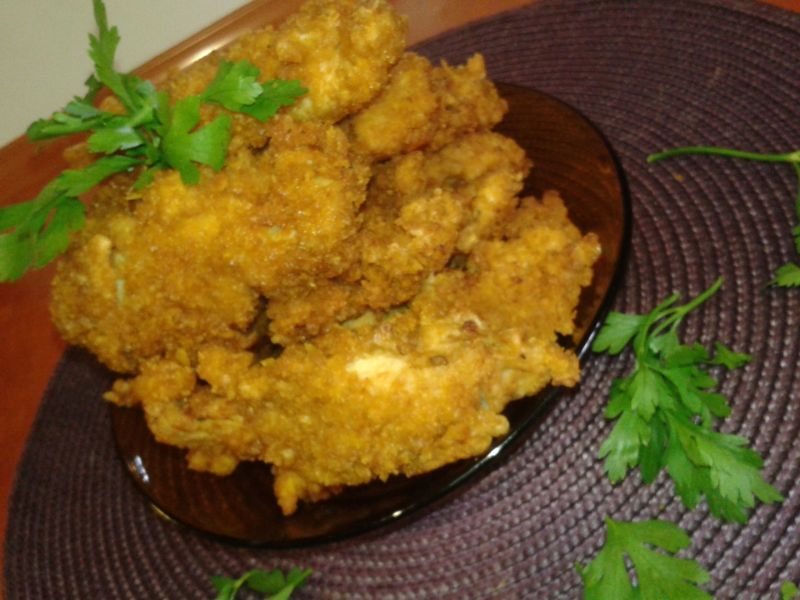 Kawałki kurczaka smażone w głębokim  tłuszczu