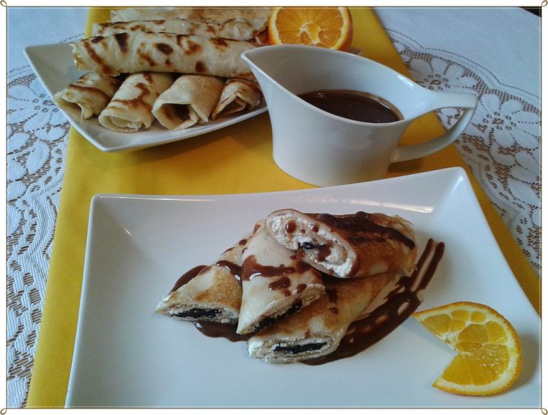 Naleśniki z serkiem z nutą pomar. i suszoną śliwką