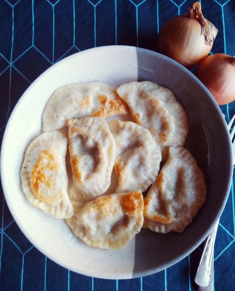 Pierogi z kapustą i pieczarkami Pierogi z kapustą i pieczarkami