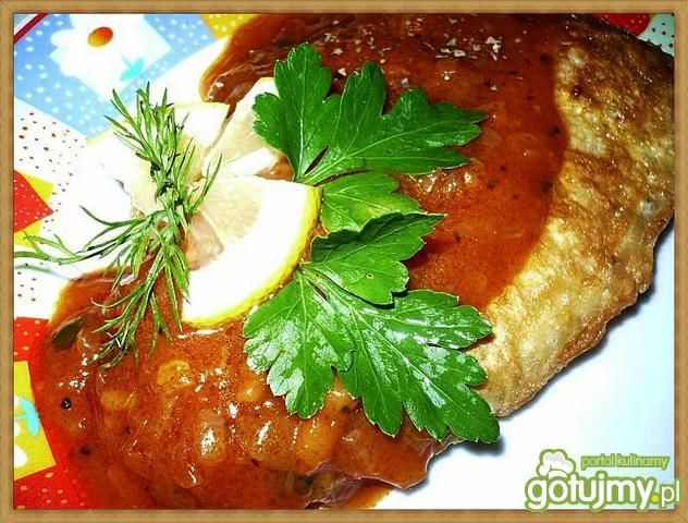Ryba w sosie pomidorowym z cytryną