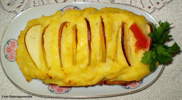 Śledź  zapiekany pod puree Śledź  zapiekany pod puree