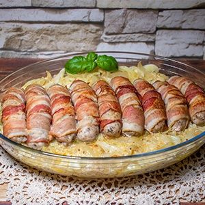Zapiekane białe kiełbasy z kapustą Zapiekane białe kiełbasy z kapustą