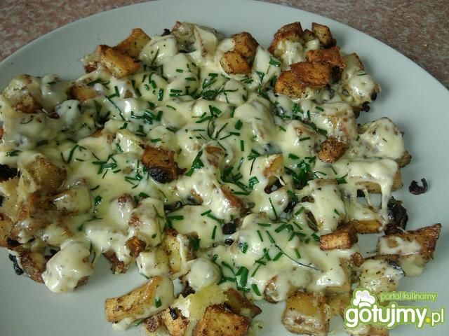 Ziemniaczki z pieczarkami pod serem 