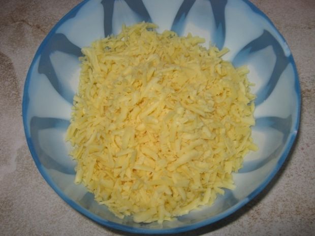 Zapiekanka ryżowa z parówkami. 